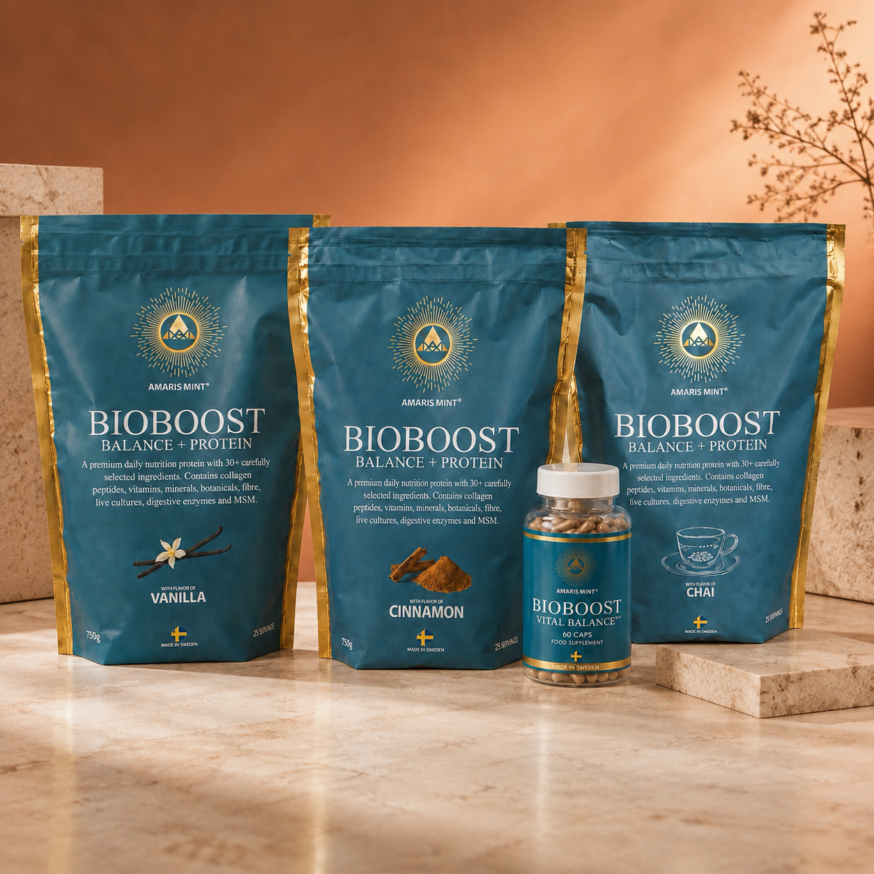 Amaris Mint BioBoost Vanilla, Cinnamon and Chai protein pouches with Vital Balance capsules on marble against a warm backdrop.