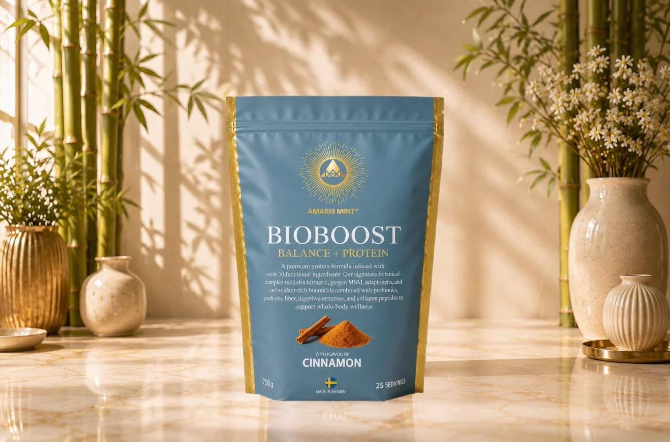 Amaris Mint BioBoost Balance + Protein Cinnamon protein powder pouch in a calm Scandinavian botanical setting.
