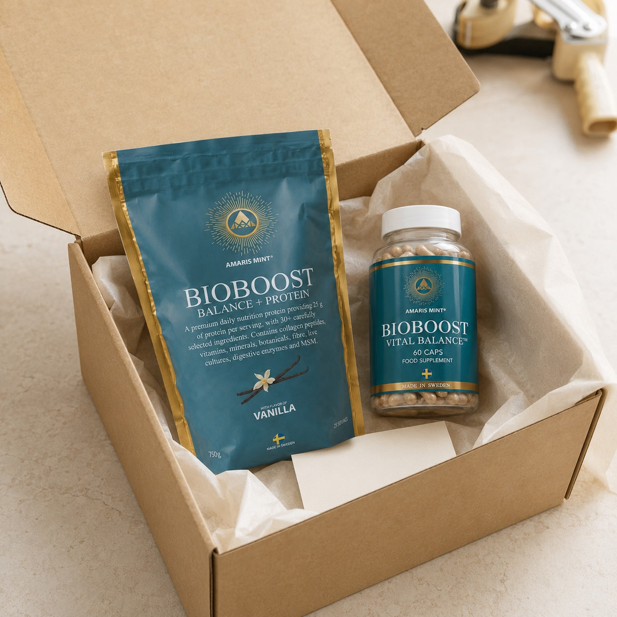 Amaris Mint BioBoost Balance+ Vanilla Protein and BioBoost Vital Balance capsules in a presentation box.