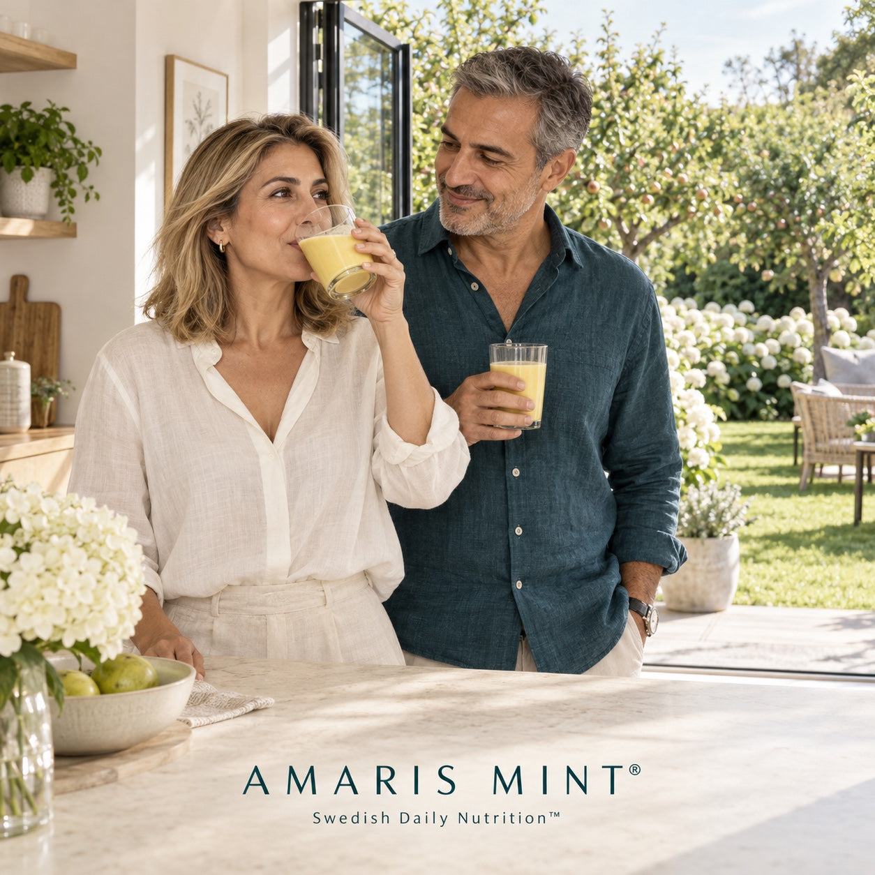 Couple enjoying Amaris Mint daily nutrition shakes together in a bright kitchen