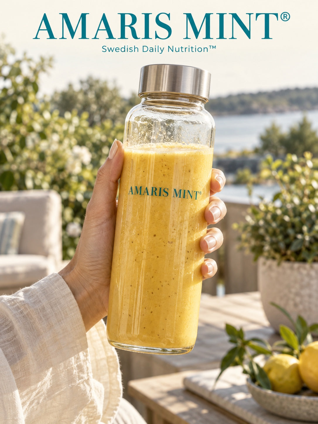 Amaris Mint daily nutrition shake in a glass bottle overlooking a Swedish lakeside setting